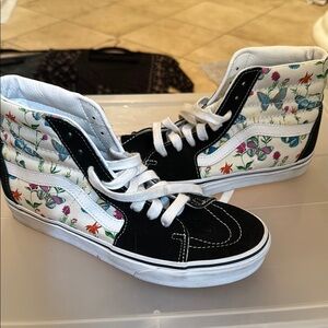 Vans Black and White High-Top Sneakers with Classic Design